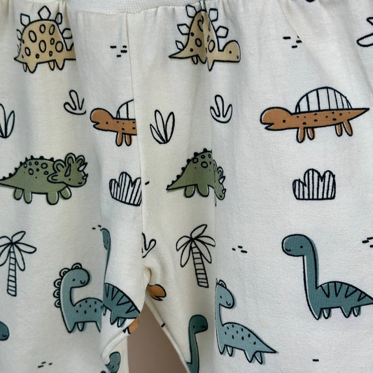 pantalon sarouel évolutif avec des motifs dinosaures multicolores